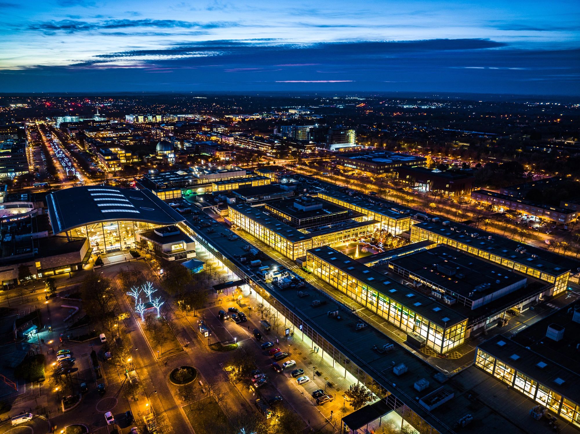 Drone view of a city centre at night