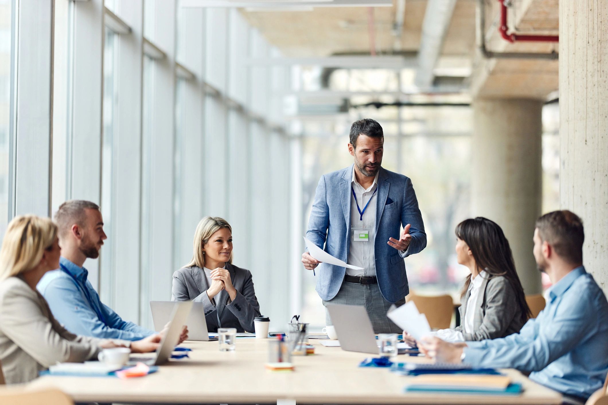 Leadership team meeting in a modern office